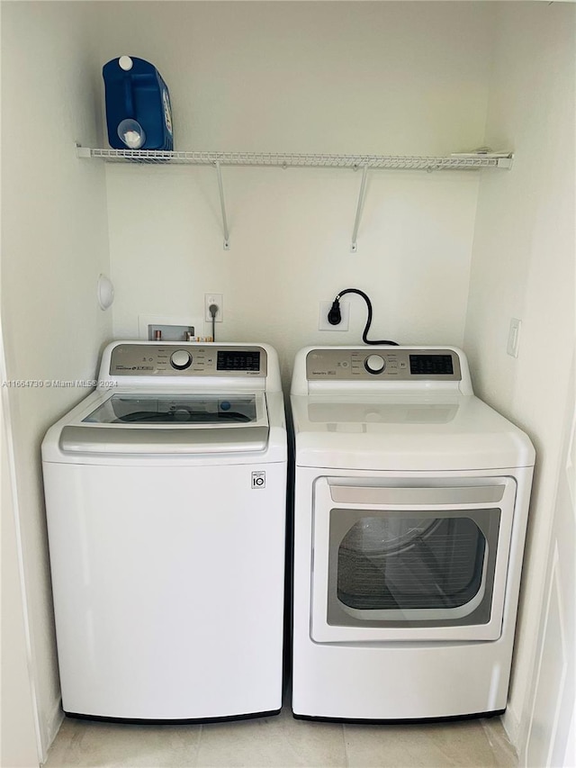 laundry room featuring washer and dryer