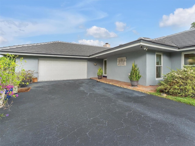 view of front of home with a garage