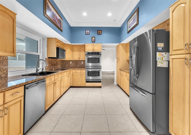 kitchen with sink, appliances with stainless steel finishes, crown molding, light stone countertops, and light brown cabinetry