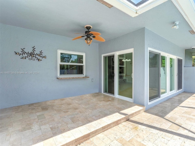 view of patio with ceiling fan