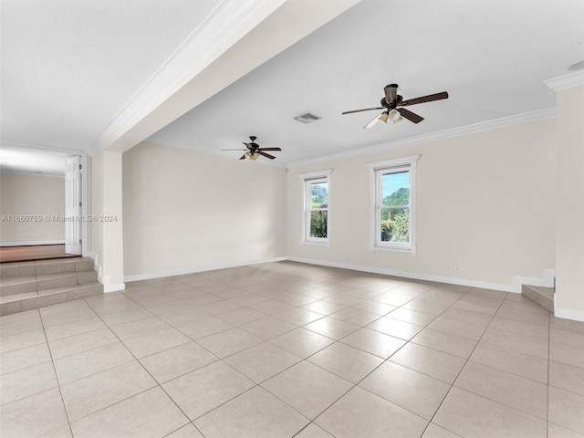 tiled empty room with crown molding and ceiling fan