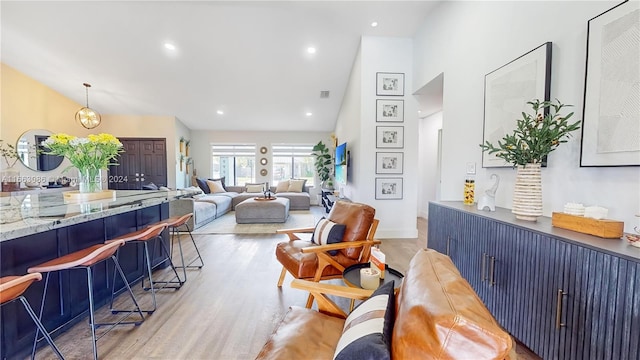 living room with light hardwood / wood-style floors