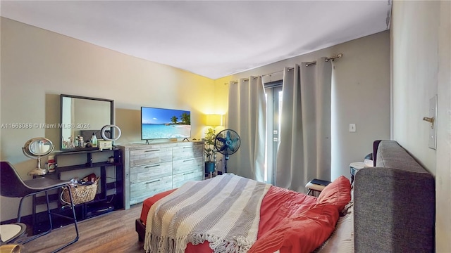 bedroom with light hardwood / wood-style flooring