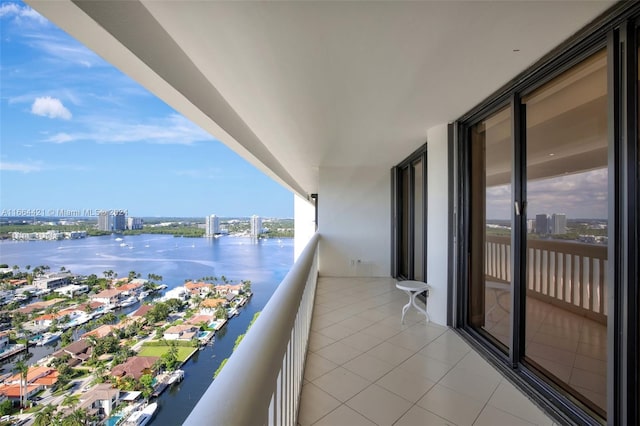 balcony featuring a water view