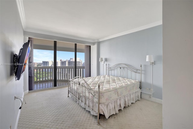 bedroom featuring access to exterior, light colored carpet, a wall of windows, and ornamental molding