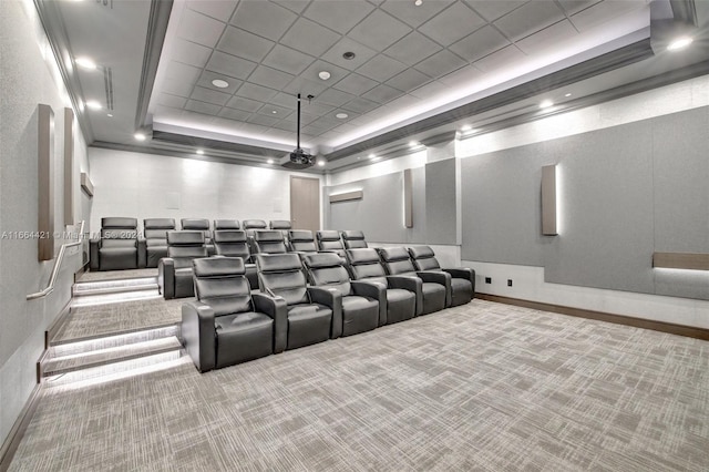 home theater room with carpet, a wall mounted air conditioner, and a raised ceiling