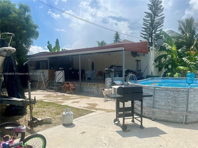 view of pool featuring a patio