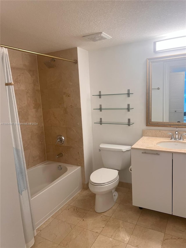 full bathroom featuring shower / tub combo, a textured ceiling, vanity, and toilet