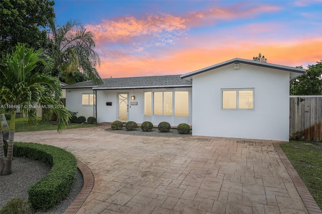 view of front of house with a patio area