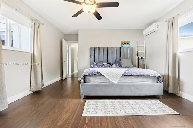 bedroom featuring ceiling fan, dark hardwood / wood-style floors, and a wall mounted air conditioner