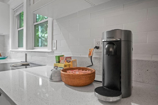 interior details with light stone counters and tasteful backsplash