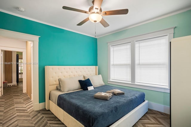 bedroom with ceiling fan, ornamental molding, and dark parquet floors