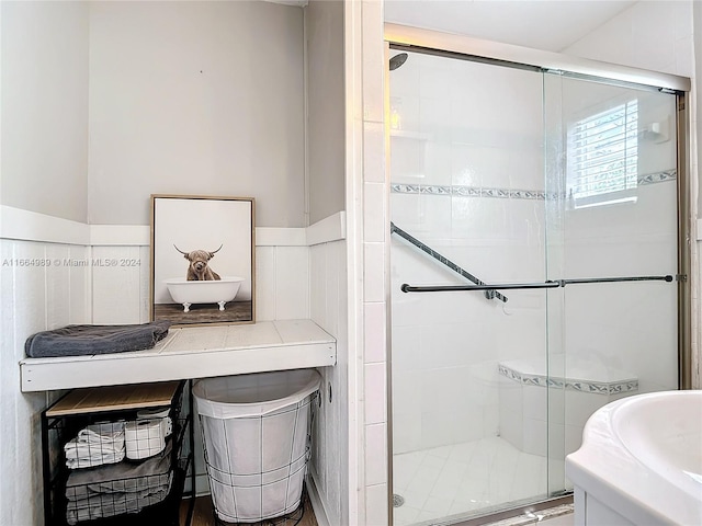 bathroom featuring an enclosed shower