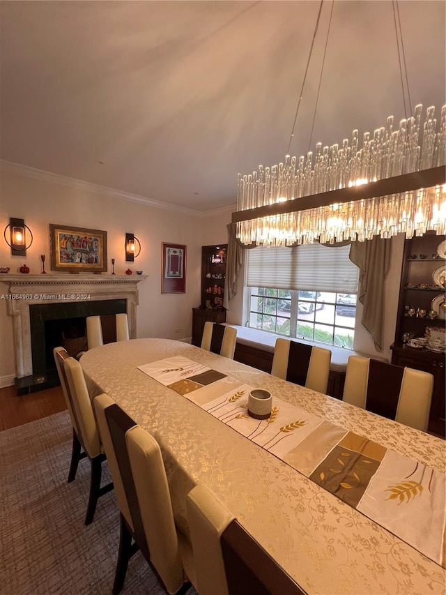 dining room with ornamental molding and dark wood-type flooring