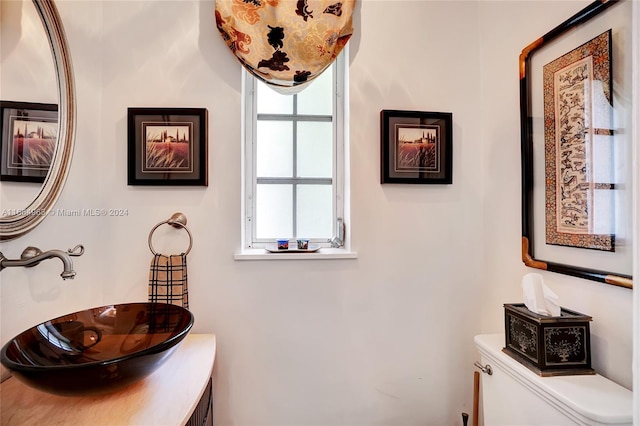 bathroom with vanity and toilet