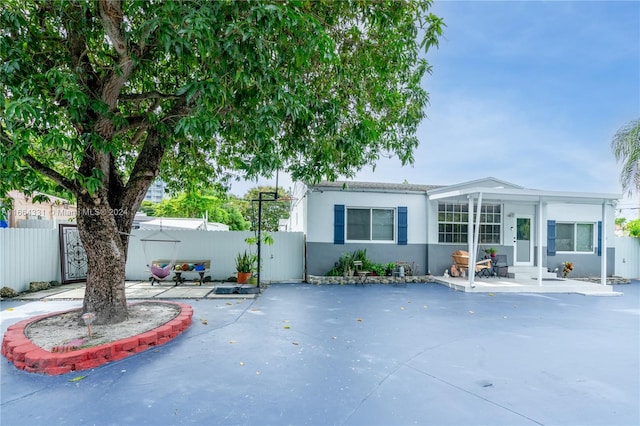 view of front of home featuring a patio area