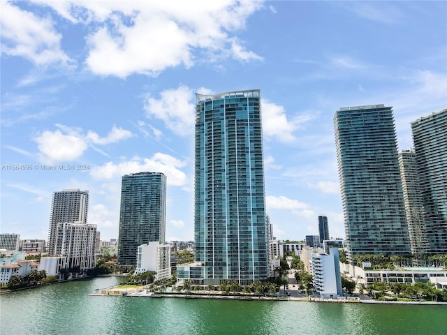 property's view of city featuring a water view