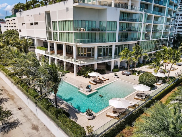 view of swimming pool featuring a patio