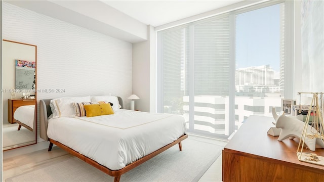 bedroom featuring hardwood / wood-style floors