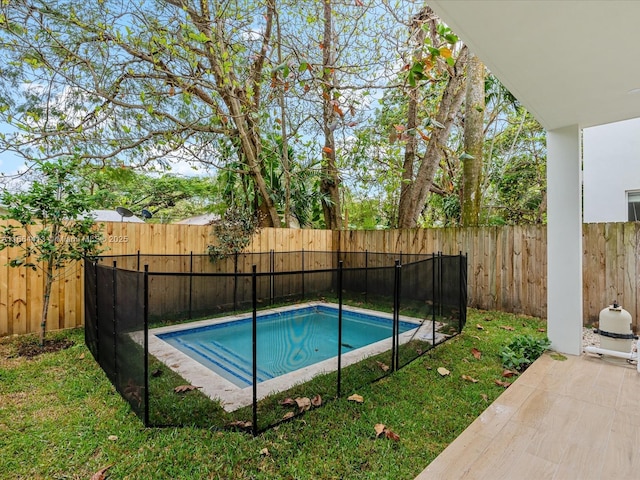 view of pool featuring a fenced backyard, a fenced in pool, and a yard