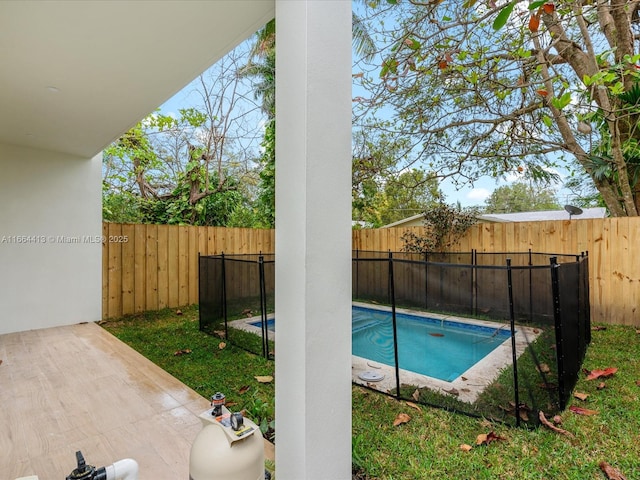 view of pool featuring a fenced backyard and a fenced in pool