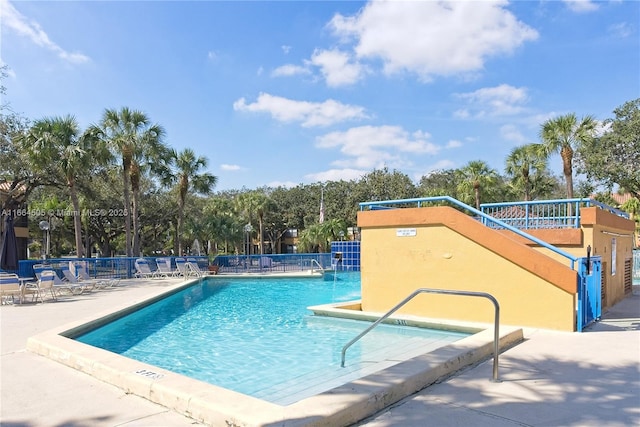 view of swimming pool with a patio