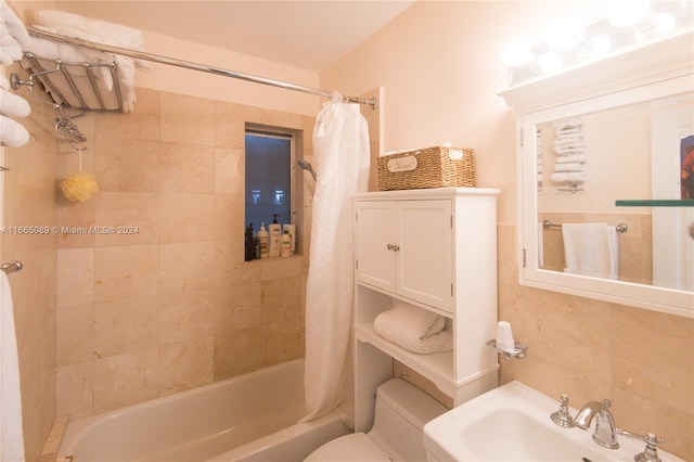 full bathroom with shower / bathtub combination with curtain, sink, and toilet