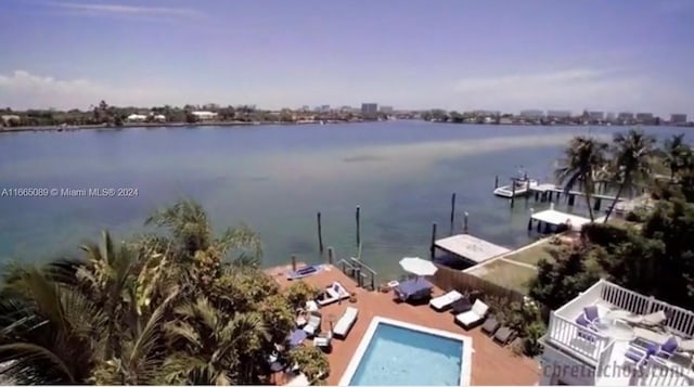 property view of water featuring a boat dock