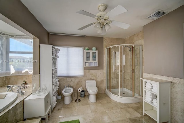 bathroom with ceiling fan, a bidet, plus walk in shower, and toilet