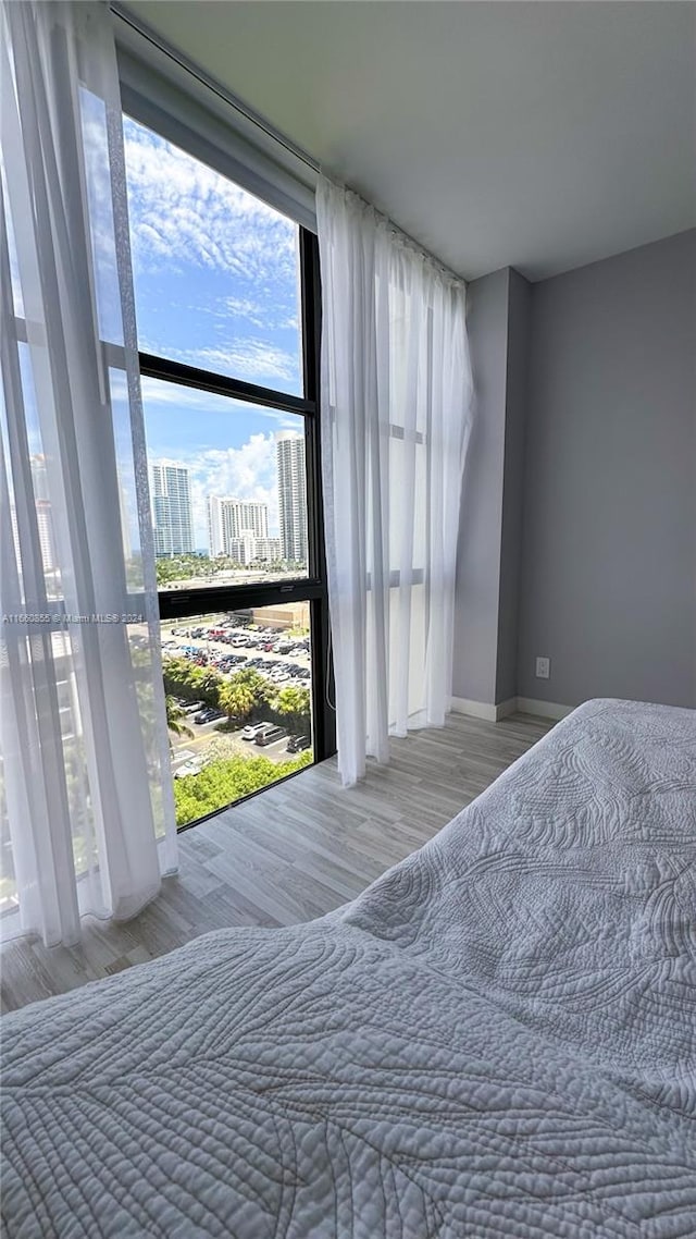 bedroom with light hardwood / wood-style floors