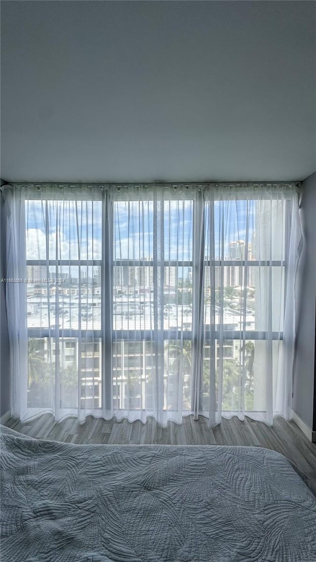 unfurnished bedroom featuring hardwood / wood-style floors