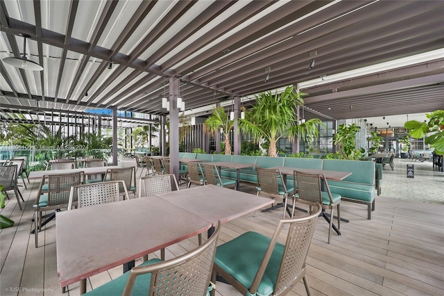 deck with outdoor dining area
