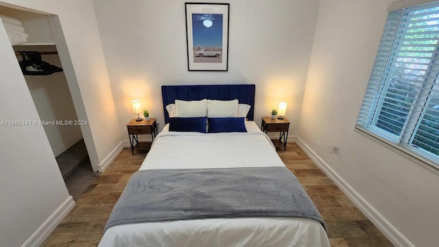 bedroom featuring hardwood / wood-style flooring