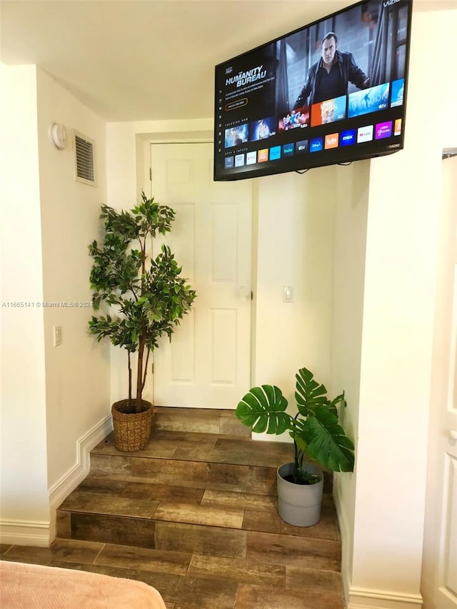 interior space featuring dark hardwood / wood-style flooring