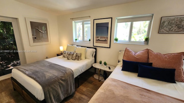 bedroom featuring dark hardwood / wood-style floors