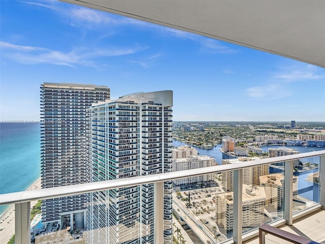 balcony featuring a water view