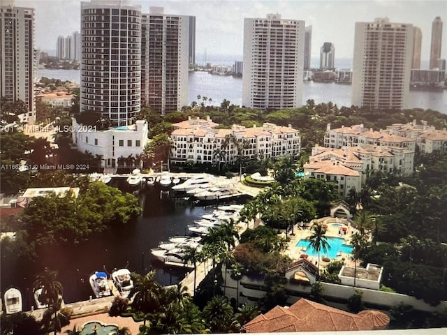 property's view of city with a water view