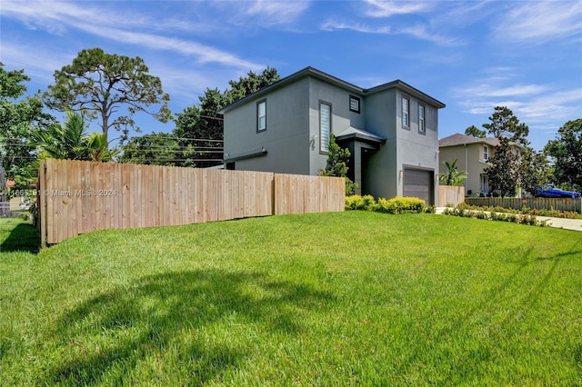 view of yard with a garage