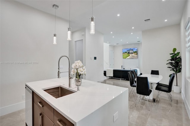 4593 Meadow Green Trl, Lake Worth, FL 33463 - kitchen featuring a sink, decorative light fixtures, light countertops, recessed lighting, and stainless steel dishwasher