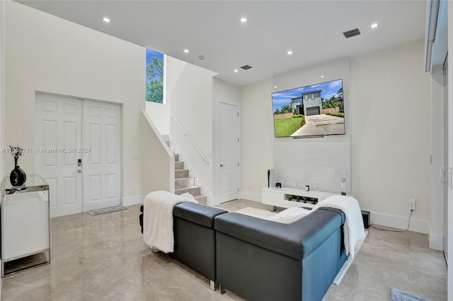 4593 Meadow Green Trl, Lake Worth, FL 33463 - living area with stairs, recessed lighting, baseboards, and finished concrete floors
