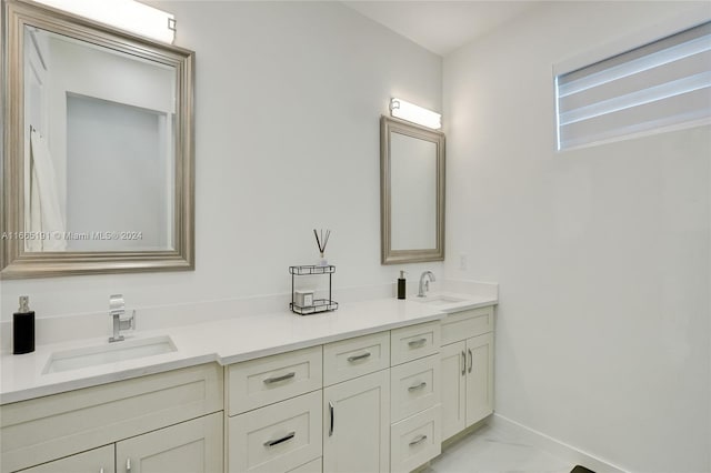 4593 Meadow Green Trl, Lake Worth, FL 33463 - full bathroom featuring marble look tiles, baseboards, and double vanity