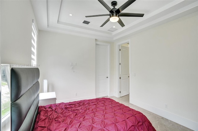 4593 Meadow Green Trl, Lake Worth, FL 33463 - bedroom featuring a tray ceiling, multiple windows, a ceiling fan, and baseboards