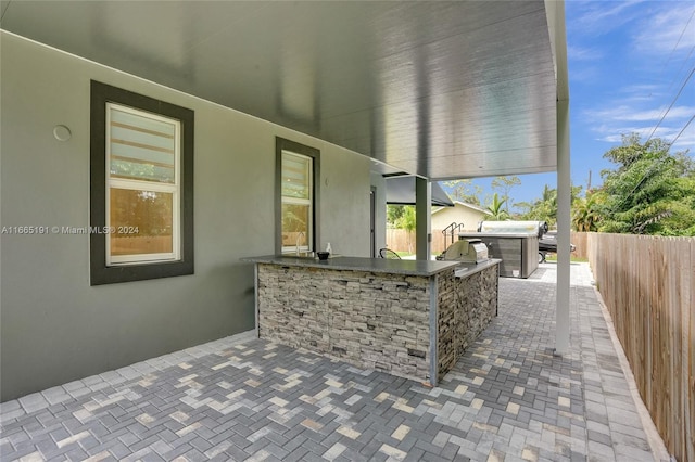 4593 Meadow Green Trl, Lake Worth, FL 33463 - view of patio featuring a fenced backyard and an outdoor kitchen