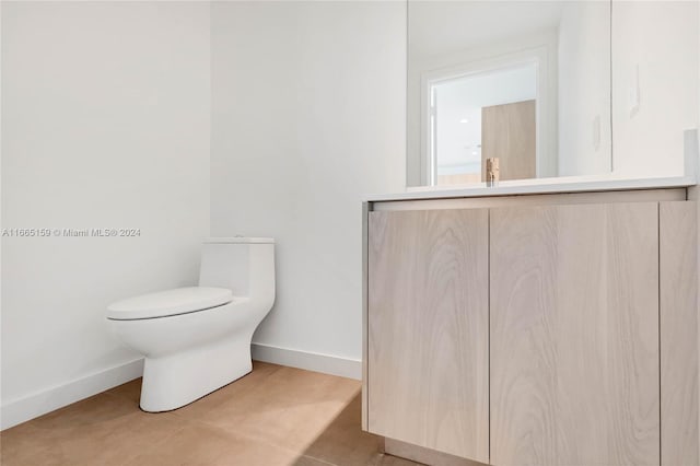 bathroom featuring tile patterned flooring and toilet