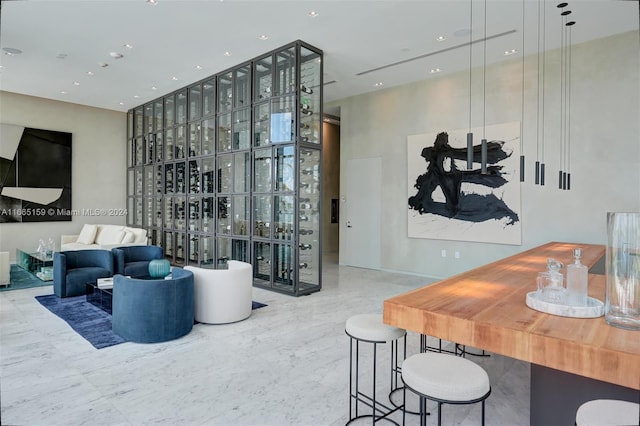 living room with a high ceiling