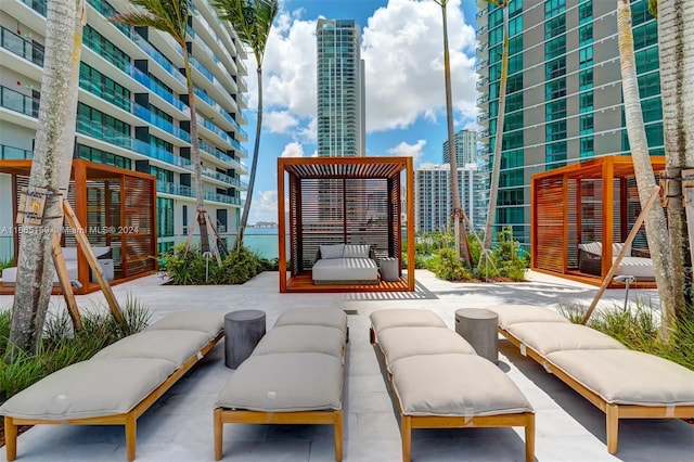 view of patio featuring a balcony