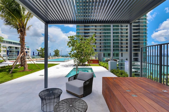 view of patio with a balcony