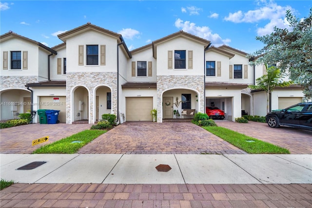 view of front of home with a garage