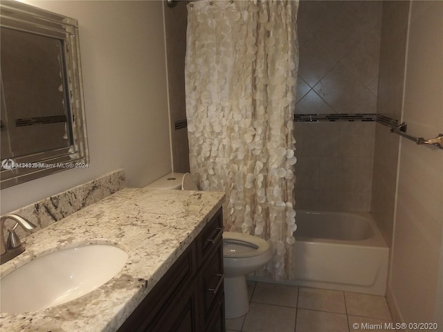 full bathroom featuring shower / bath combo, vanity, toilet, and tile patterned floors