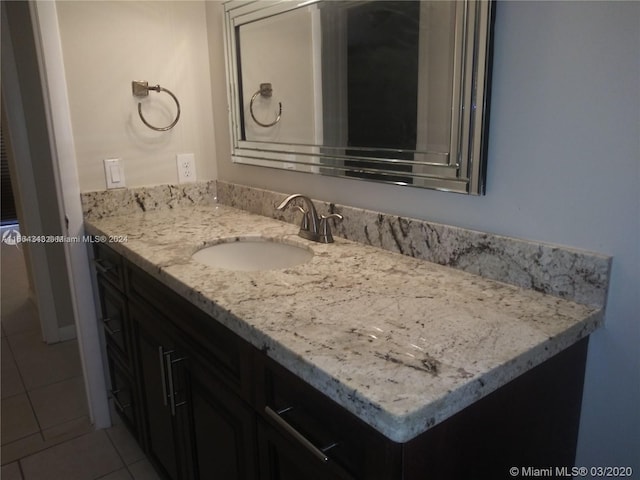 bathroom featuring vanity and tile patterned floors